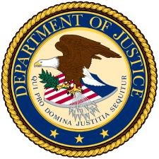 A picture of the department of justice seal.
